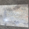 Beige onyx natural stone tile, 12x24 polished surface from RN, showcasing smooth, glossy finish and elegant stone pattern.