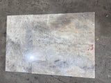Beige onyx natural stone tile, 12x24 polished surface from RN, showcasing smooth, glossy finish and elegant stone pattern.