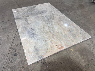Beige Onyx 12x24 polished natural stone tile from RN, showing smooth, glossy surface with natural stone pattern and warm beige tones.