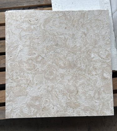 Natural stone tile from RN, Eastern Shell Limestone 24x24 brushed tile showing textured, neutral-toned surface for flooring or walls.