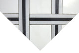 Close-up of polished Dolomite and black marble mosaic tile with linear detailing