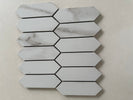 Calacatta marble picket mosaic installed as a luxury kitchen backsplash with polished finish