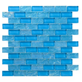 Crystal Aqua Osaka Sky Blue 1x2 glass mosaic tile featuring vibrant sky blue tones for swimming pools, pool waterlines, spas, and water features.