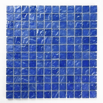 Crystal Aqua Soho Deep Blue 1x1 glass mosaic tile featuring rich blue tones for swimming pools, pool waterlines, spas, and water features.