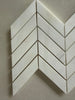 Dolomite chevron marble mosaic installed as a sophisticated kitchen backsplash