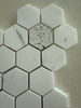 Dolomite marble hexagon terrazzo mosaic installed as a modern kitchen backsplash