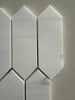 Dolomite picket honed marble mosaic installed as an elegant kitchen backsplash with soft matte finish