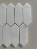 Dolomite marble picket mosaic used on a modern bathroom shower wall with clean linear layout
