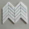 Dolomite polished 1x4 chevron marble mosaic tile featuring white marble and subtle gray veining