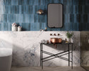 Dune Agadir Lago Bright porcelain wall tile installed as a kitchen backsplash