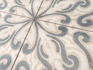 Dune Atlantique Josselin 8x8 decorative porcelain tile installed in a stylish residential entryway