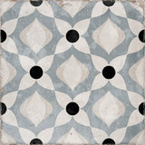 Blue and white patterned porcelain tile flooring featured in a bright residential interior