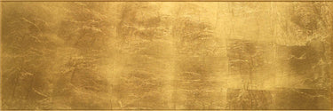 Gold-inspired glass wall tile creating a dramatic feature wall

