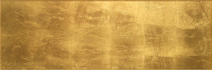 Gold-inspired glass wall tile creating a dramatic feature wall
