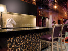 Decorative metallic glass tile installed as a luxury accent wall
