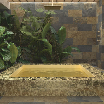 Metallic-inspired porcelain tile installed in a luxury pool design