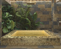 Metallic-inspired porcelain tile installed in a luxury pool design
