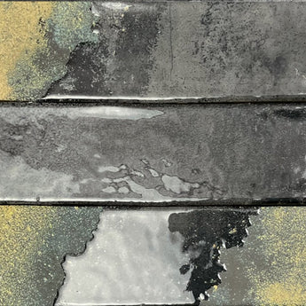 Mediterranean-inspired glazed wall tile featuring deep carbon tones
