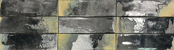 Mediterranean-inspired glazed wall tile featuring deep carbon tones

