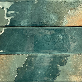 Glossy emerald green porcelain tile installed as a kitchen backsplash