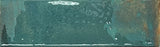 Decorative accent wall showcasing glossy green glazed porcelain tile