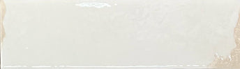 Artisan-look ivory porcelain tile used on a shower wall
