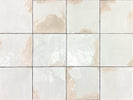 Artisan-look porcelain tile installed on a bathroom wall
