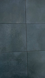 Deep blue anti-slip porcelain tile installed around a luxury swimming pool
