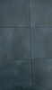 Deep blue anti-slip porcelain tile installed around a luxury swimming pool
