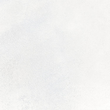 Close-up of Dune Greenland Frost matte anti-slip color body porcelain tile showcasing soft white tones and natural variation