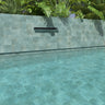 Teal anti-slip porcelain tile installed around a luxury swimming pool
