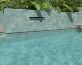 Teal anti-slip porcelain tile installed around a luxury swimming pool
