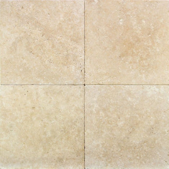 Ivory travertine 16x16 filled and honed field tile with tumbled edges, perfect for flooring or wall applications.