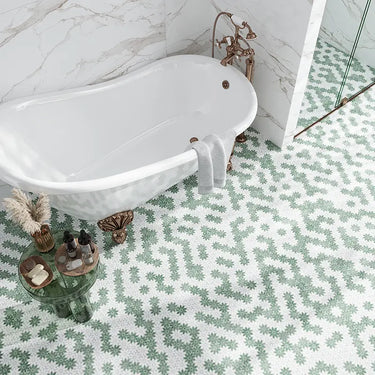 Close-up of Kerry Natural Stone Mosaic Tile by Mir showing textured, earthy stone pieces arranged in a mosaic pattern.