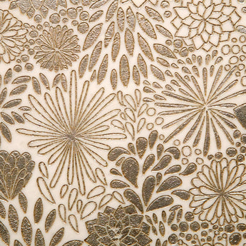 White marble mosaic tile from Mythology Tile's Lidya Garden collection, showcasing a detailed wall installation with intricate patterns.