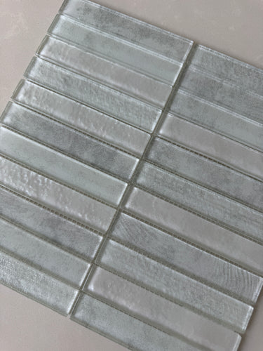 Warm neutral Dune glass mosaic tile used for a sophisticated kitchen backsplash
