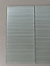 Roca Lux Opal 12x12 flutted glass mosaic wall tile with textured, shimmering opal finish for decorative feature walls.