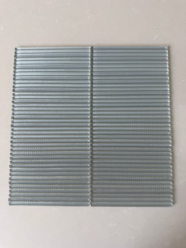 Lux Smoke 12x12 flutted glass mosaic tile with sophisticated smoky tones and dimensional texture

