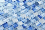 Petra Blue glass mosaic tile used as a kitchen backsplash featuring rich blue tones and contemporary glass mosaic styling.