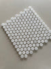 Polished Dolomite penny round marble mosaic installed on a luxury bathroom floor