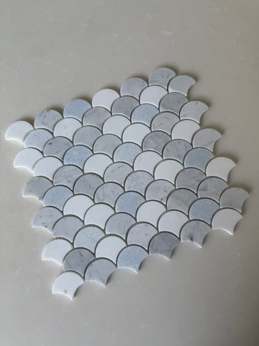 Roca Rockart blue mix Carrara Thassos fan-shaped 12x12 inch natural stone mosaic tile for flooring or backsplash.