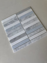 Rockart polished blue and white stacked natural stone mosaic used on an interior floor
