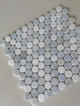 Blue mix penny round natural stone tile from Roca, 12x12 mosaic for backsplash or wall decor, featuring vibrant blue hues and smooth round edges.