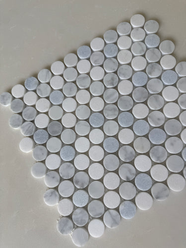 Blue mix penny round natural stone tile from Roca, 12x12 mosaic for backsplash or wall decor, featuring vibrant blue hues and smooth round edges.