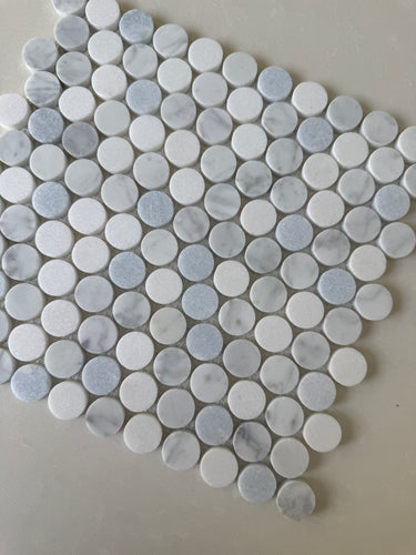 Blue mix penny round mosaic tile by Roca, natural stone flooring with small, round 12x12 inch mosaic pattern.