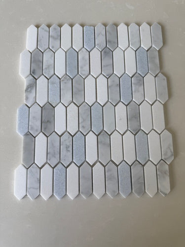 Blue and white Thassos mosaic tile by Roca, featuring a mix of natural stone picket design for floor or wall decoration.