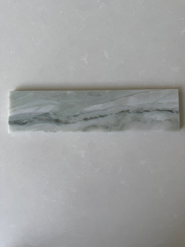 Roca Rockart green marble brick tile, 2x10 natural stone floor tile with polished green marble pattern and smooth surface.