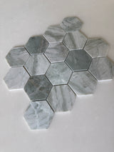 Green marble hexagon mosaic tile from Roca, natural stone with a polished finish, 12x12 inch backsplash or wall tile.