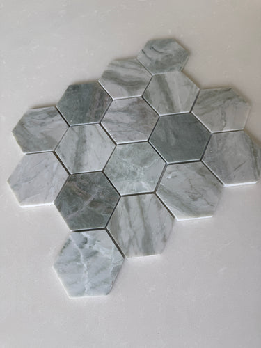 Green marble hexagon mosaic tile from Roca, natural stone with a polished finish, 12x12 inch backsplash or wall tile.