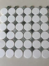 Roca Rockart Green Mix Thassos Circle mosaic tile for shower walls, featuring natural stone in green and white tones.